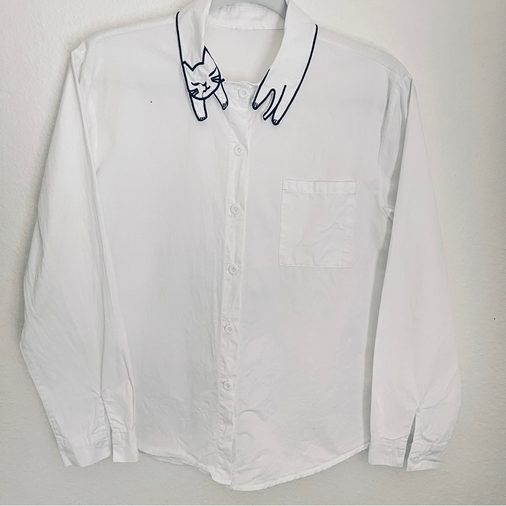 White button down women’s blouse with kitty cat wrap collar